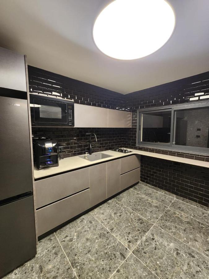 מבנים בים 75 Suites At Sea Haifa Exterior foto